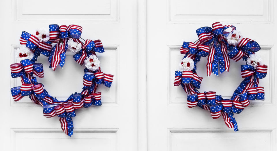 Patriotic Red White and Blue Wreaths on White Door